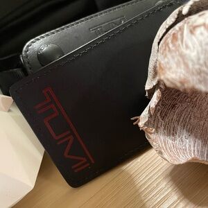 TUMI Black duffle bag